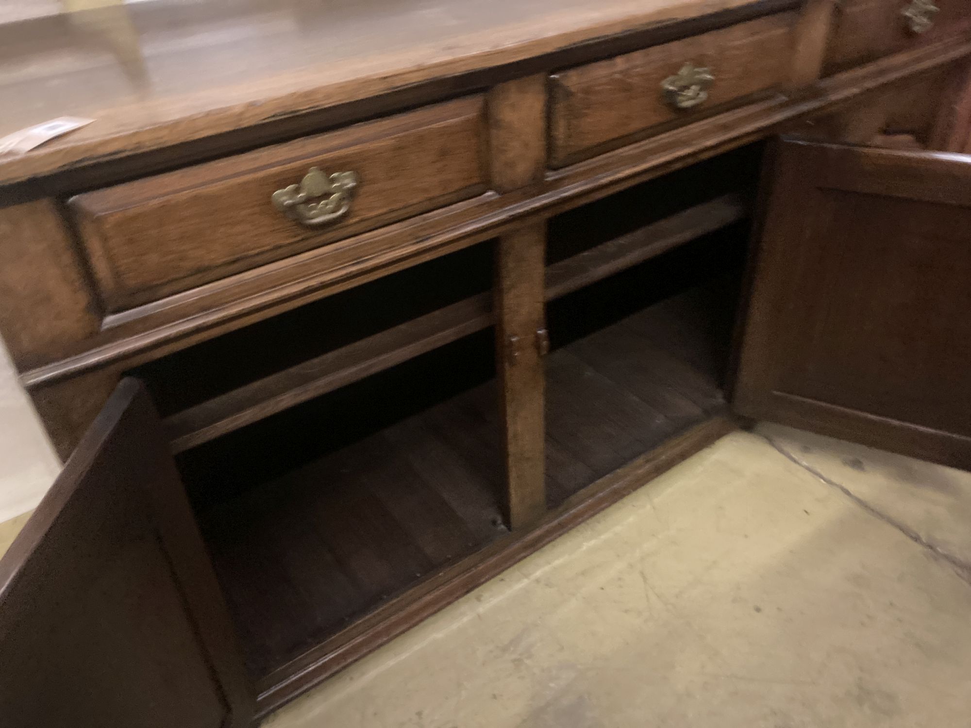 A Georgian style oak dresser base, width 170cm depth 53cm height 84cm